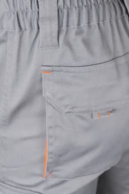 Pantalón stretch bicolor multibolsillos